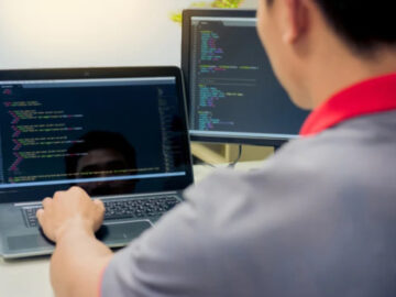 How to Hire Remote Developers: Step-by-Step Guide a remote software developer working on a laptop